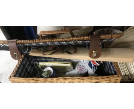 A wicker picnic hamper containing sundry china, a Gloucestershire County Cricket Club cricket bat signed by various players i