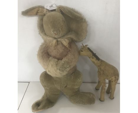 A 1930s Chiltern silver and pink plush skater rabbit in hooded jacket, approx. 42 cm high together with a felt covered giraff