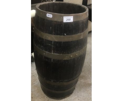 A vintage coopered oak and brass bound stick stand of barrel form, 24.5 cm diameter at rim x 56 cm high