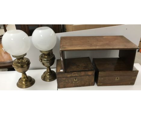 A Victorian carved walnut folding book trough, the end panels decorated with oak leaf and acorn and/or grape and vine, the ce