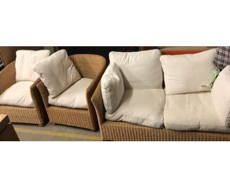A pair of caned conservatory tub chairs, 74 cm wide x 77 cm deep x 71 cm high together with a similar two seat sofa, 151 cm l