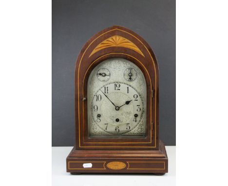 Edwardian Mahogany Inlaid Arched Top Three Train Mantle Clock, the engraved white metal face with Fast / Slow Dial and Chime 