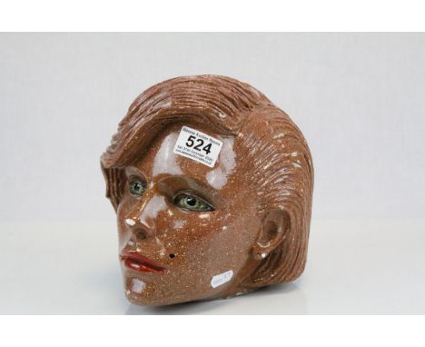A  retro style fibreglass head with a ceramic coating.
