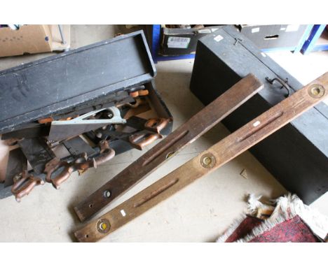 Two Victorian Wooden Tool Boxes, Collection of Various Wood and Metal Work Saws and Two Vintage Wooden Levels with Brass Moun