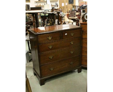 Early 19th century Mahogany and Cross-Banded Chest of Two Short over Three Long Drawers raised on Bracket Feet, 103cms wide x