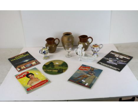 Mixed Lot including Continental White Glazed Ceramic Cherub in a Boat, Stoneware Jugs and a Vase, Two Faience Oil Lamps, Star