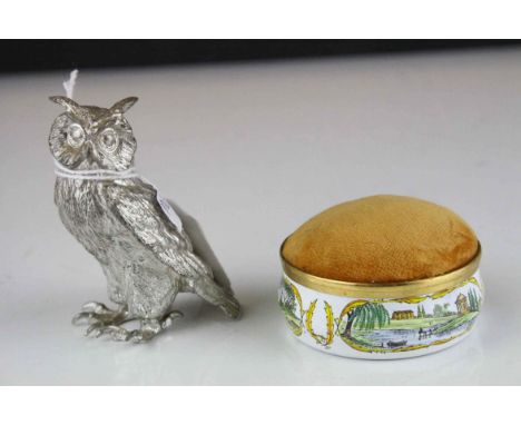 Heavy cast metal owl figure in perched position, made in England stamp, together with a Crummles &amp; Co enamel pin cushion 