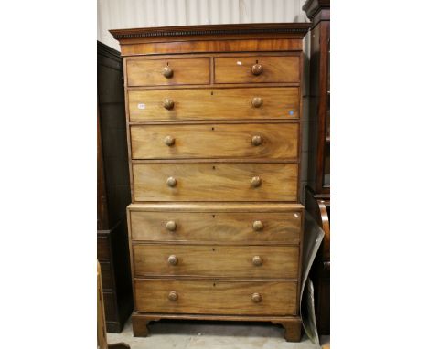 George III Mahogany Chest on Chest, with an arrangement of eight drawers, raised on bracket feet (with replaced handles), 198