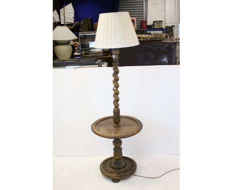 Oak Standard Lamp with Wine Shelf, the barley-twist column with acanthus leaf carving, 150cms high