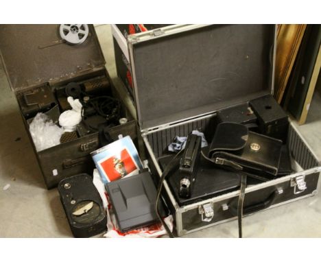 A group Brownie type cameras a vintage cased Cine Kodak 8 model 25 camera four other vintage cine cameras,a spotter scope,tog
