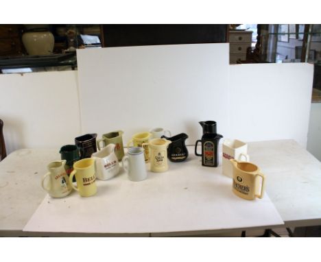 Collection of Fifteen Ceramic Pub Advertising Water Jugs including Wade and Martell Grand National Void Race  Jug