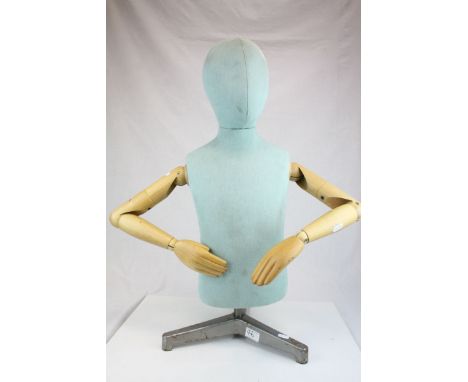 Child Size Half Mannequin with Fabric Covered Head and Body, Articulated Wooden Arms and Hands and raised on a Metal Tripod S