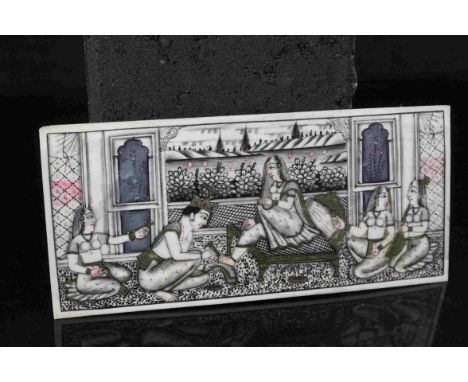 Painted Ivory Panel depicting Indian Lovers and musicians, dimensions approx 6.5cm x 15cm
