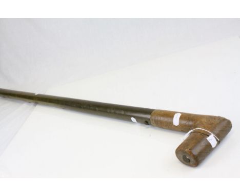 A vintage agricultural soil testing walking stick .