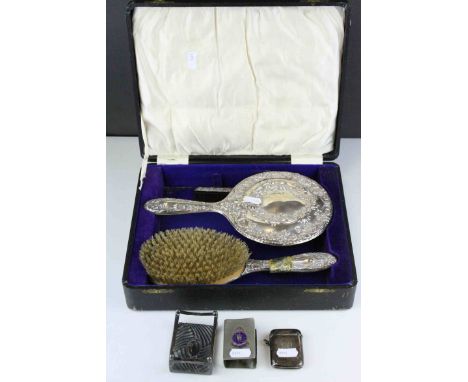 Silver backed dressing table brush set comprising mirror, hair brush (af) and comb, cased together with a silver match box ho