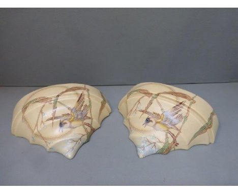 A pair of Gray's Pottery ceramic wall pockets decorated with birds. 