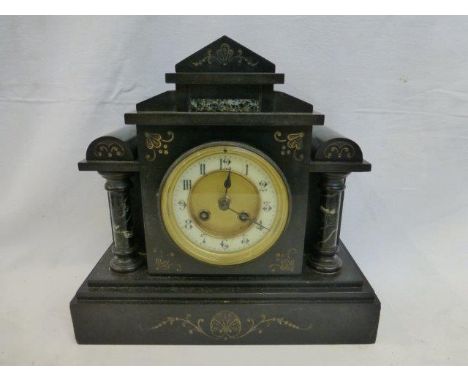 An Edwardian slate mantle clock. 