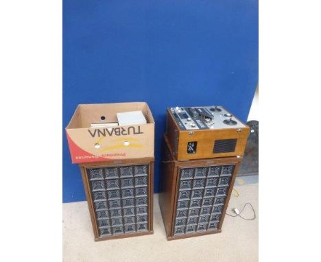 A large pair of wooden cased Akai floor standing speakers, an X360 Akai reel to reel recorder and a quantity of tape spools.