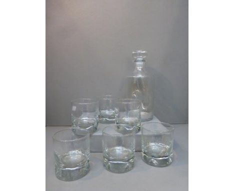 A glass decanter and six matching tumblers. 
