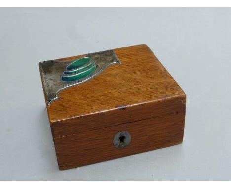 A wooden lidded box with applied silver and enamel decoration,  maker D & S, Birmingham 1903.
