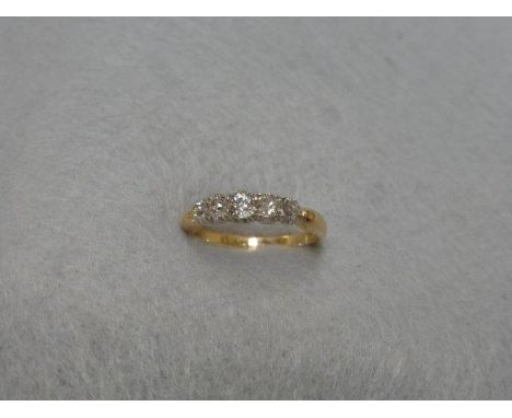 A Victorian 18ct gold five stone diamond ring, size J/R. 