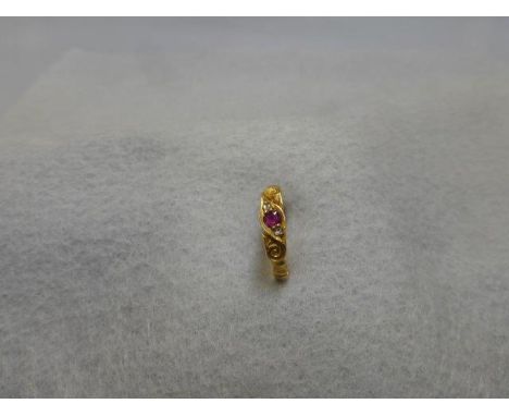 A Victorian style 18ct gold diamond and ruby ring, size O. 