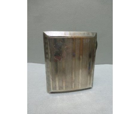 A silver cigarette case, maker JG Ltd. Birmingham 1924, with engine turned decoration. 