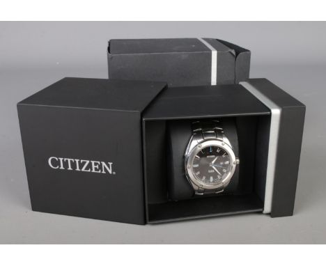 A Citizen Eco-Drive watch with stainless steel strap in original box.