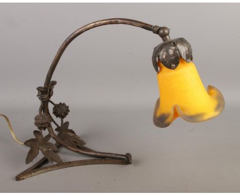 A French Art Nouveau adjustable lamp featuring bronzed frame and tulip shaped yellow shade marked 'LNF'.  European plug.
