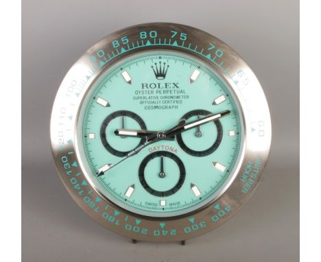A Rolex dealer display concessionary wall clock, "Daytona" silver bezel surround with Tiffany blue dial.  Quartz movement, wo