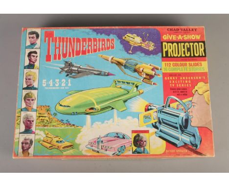 1966 Chad Valley Thunderbirds Give-A-Show Projector Set: Complete with all 16 strips/stories totalling 116 colour slides