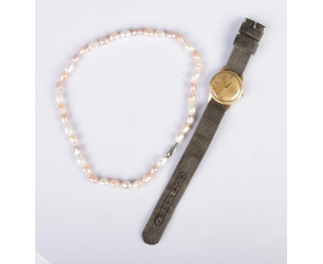 A silver clasped cultivated pearl necklace along with a gent's Avia manual wristwatch.