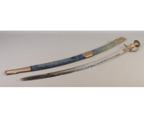 An Indian Talwar sword with scabbard and pointed pommel. The blade with stencilled detailing and stamped 'Made in India'. Bla