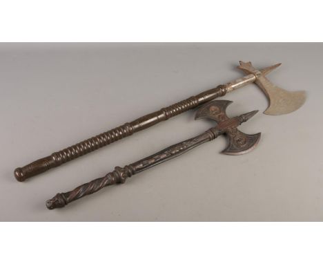 A medieval style cast metal double headed axe, together with an Indian souvenir 'Sun' battle axe. CANNOT POST.