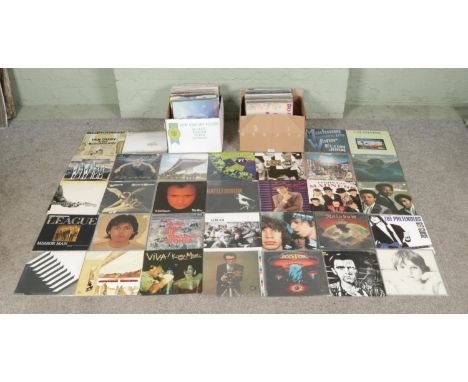Two boxes containing a good collection of mainly rock and pop vinyl records. To include U2, Phil Collins, Human League, Paul 