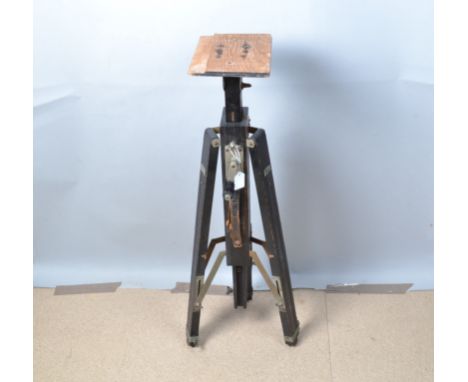 An L Gandolfi Wooden Studio Tripod, black, two section legs, handle wound ratchet centre column, leather carrying handle, til