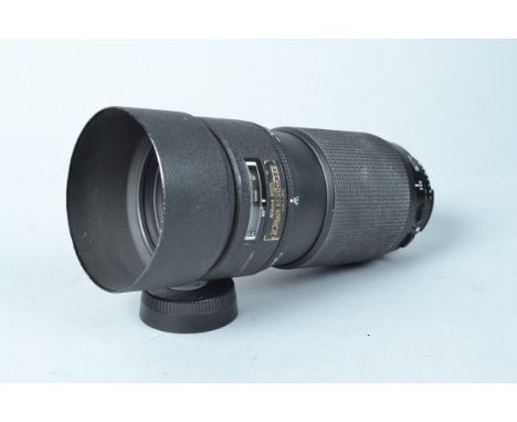 A Nikon ED AF Nikkor 80-200mm f/2.8 lens, only focusing on manual setting, AF not working, barrel F-G, scratches, small dings