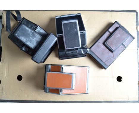 Polaroid Cameras, a Polaroid SX-70 Alpha 1, SX-70 Sonar auto focus (AF), SX-70 model 2, cracking to leatherette, in maker's b