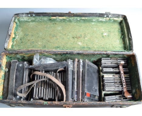 A Graflex Speed Graphic Camera, body P, damp damage, mildew, surface corrision throughout, with Carl Zeiss Jena 5cm f/4.5  Te