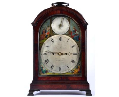 A Mahogany Quarter Striking Table Clock, triple pad top pediment with a carrying handle, fish scale pierced side sound frets,