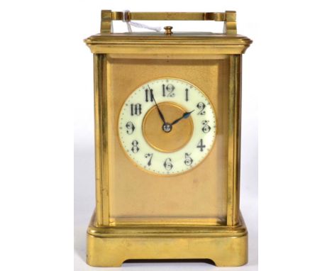 A Brass Striking and Repeating Carriage Clock, circa 1900, carrying handle and repeat button, enamel Arabic numeral chapter r