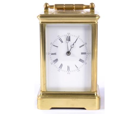 A Brass Striking and Repeating Carriage Clock, retailed by Hry Marc, Paris, circa 1890, carrying handle and repeat button, en