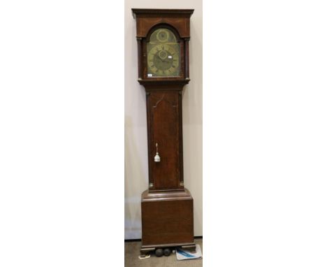 An Oak Eight Day Longcase Clock, flat top pediment, arched trunk door, 12-inch arched brass dial with chapter ring signed Wm 