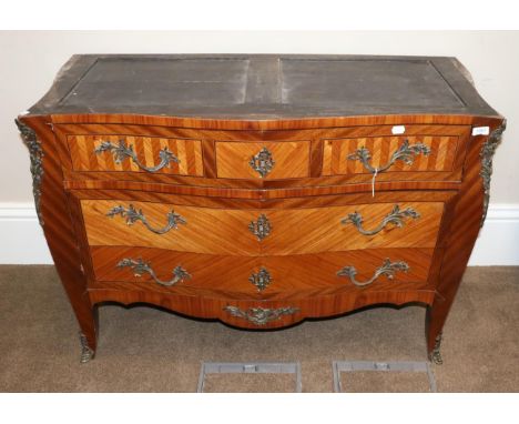 A French Tulipwood, Bois Satine and Gilt Metal Mounted Commode, early 20th century, in Louis XV style, with three long drawer
