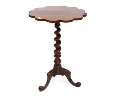 A Victorian Mahogany Tripod Table, 3rd quarter 19th century, the shaped top above a spiral turned support with three cabriole