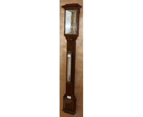 An Oak Stick Barometer, signed Newton & Co, 3 Fleet Street, Temple Bar, London, circa 1870, concealed mercury tube with a twi