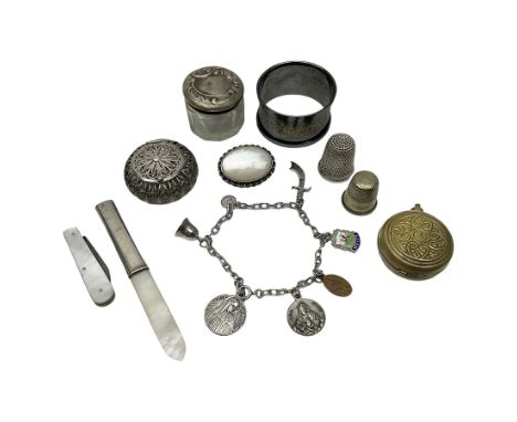 Silver napkin ring, hallmarked, together with Indian silver wirework trinket box, charm bracelet with some silver charms, pen