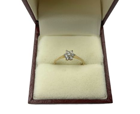 9ct gold cubic zirconia flower cluster ring, hallmarked and boxed Condition Report:Approx 1.09 grams, size L-M, well presente