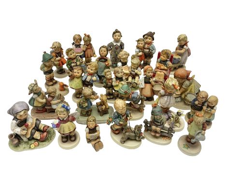 Twenty five Hummel figures by Goebel, to include, School Girl, Visiting an Invalid, Big Housecleaning, Village Boy etc  