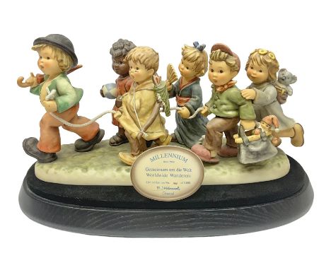 Large Hummel figure group by Goebel, World Wide Wonderer's, limited edition 1960/2000, on plinth, H28cm  